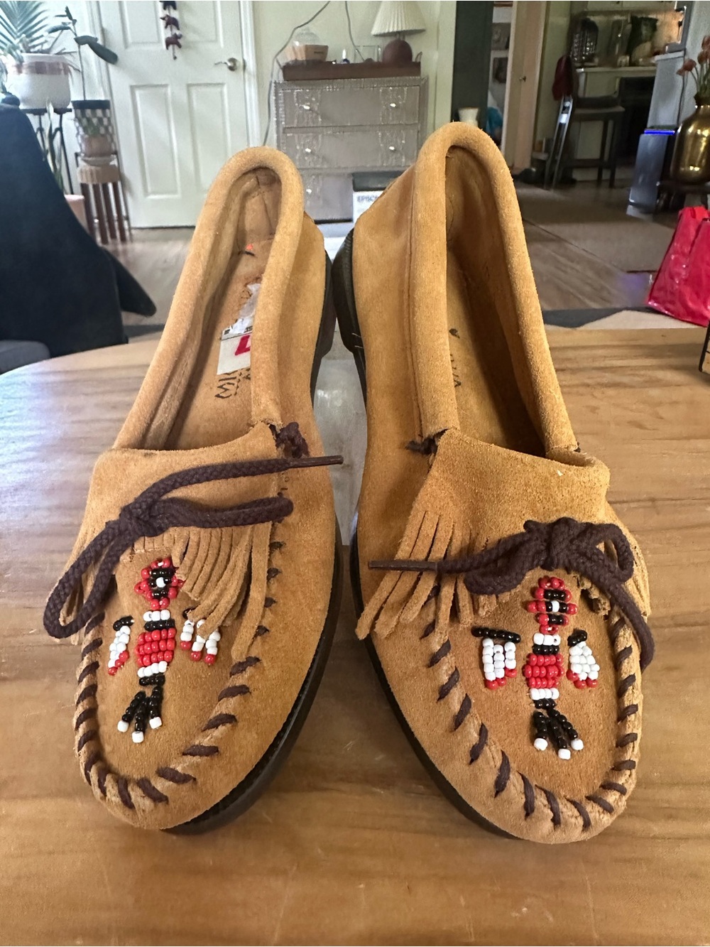 Minnetonka Tan Suede Beaded Fringe Moccasins like new.  Size 7